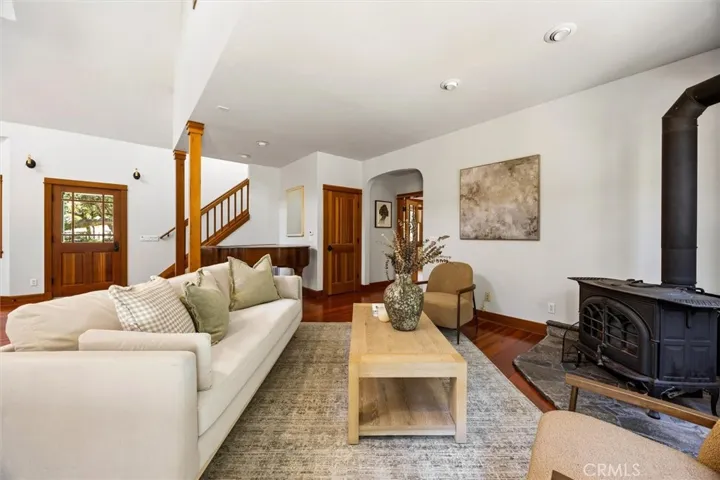 Great room with large closet and space for piano- which is included with the home