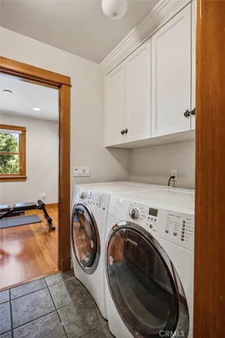 Utility room , just off kitchen- with Electrolux washer and dryer, included