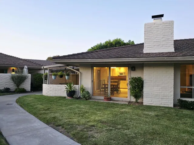 Living Room/Dining Area Sliding Glass Door Looking NW at Twilight