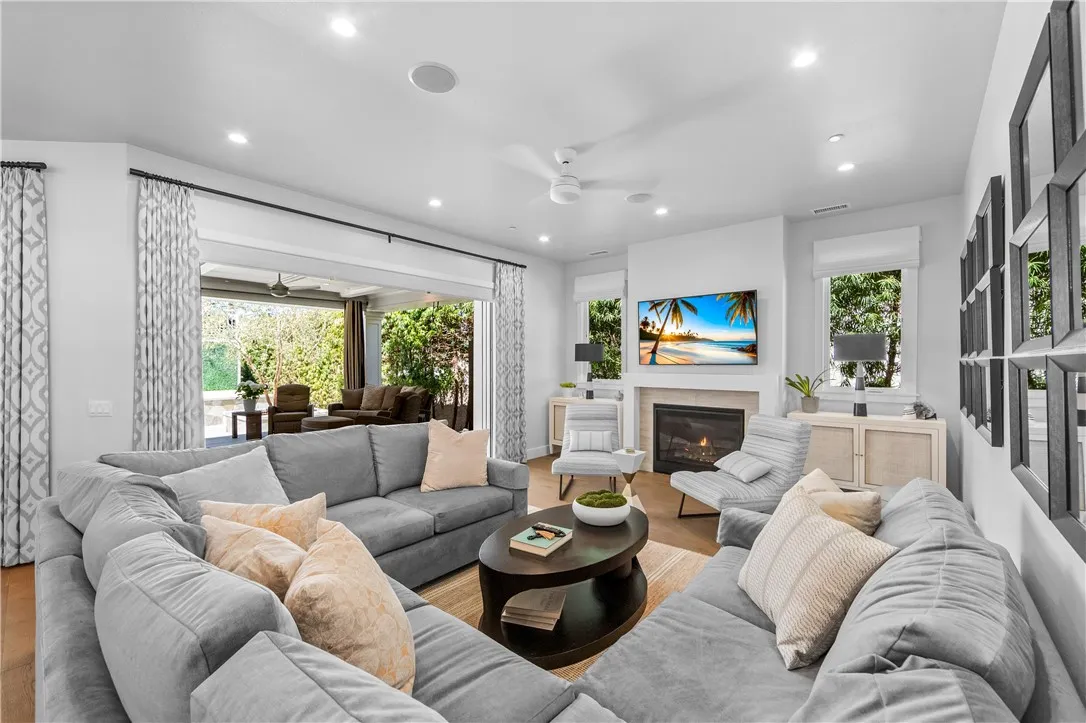 Family room with fireplace open to backyard