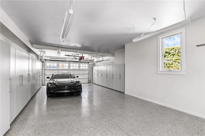 Garage photo has been edited to remove storage items
