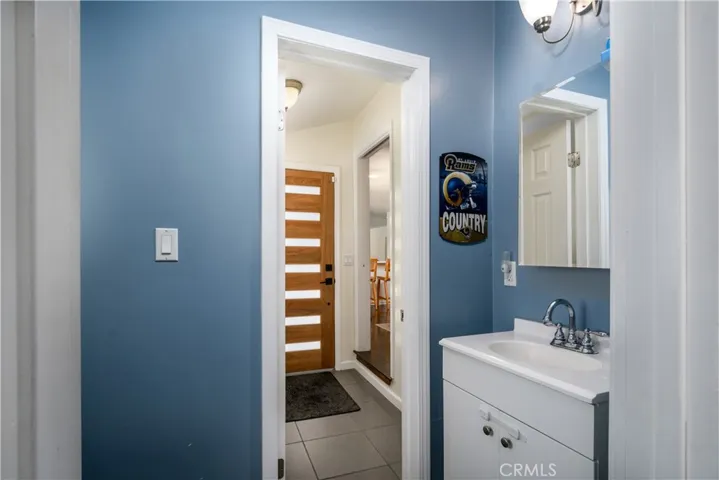 Half Bathroom Off Laundry/Storage Area