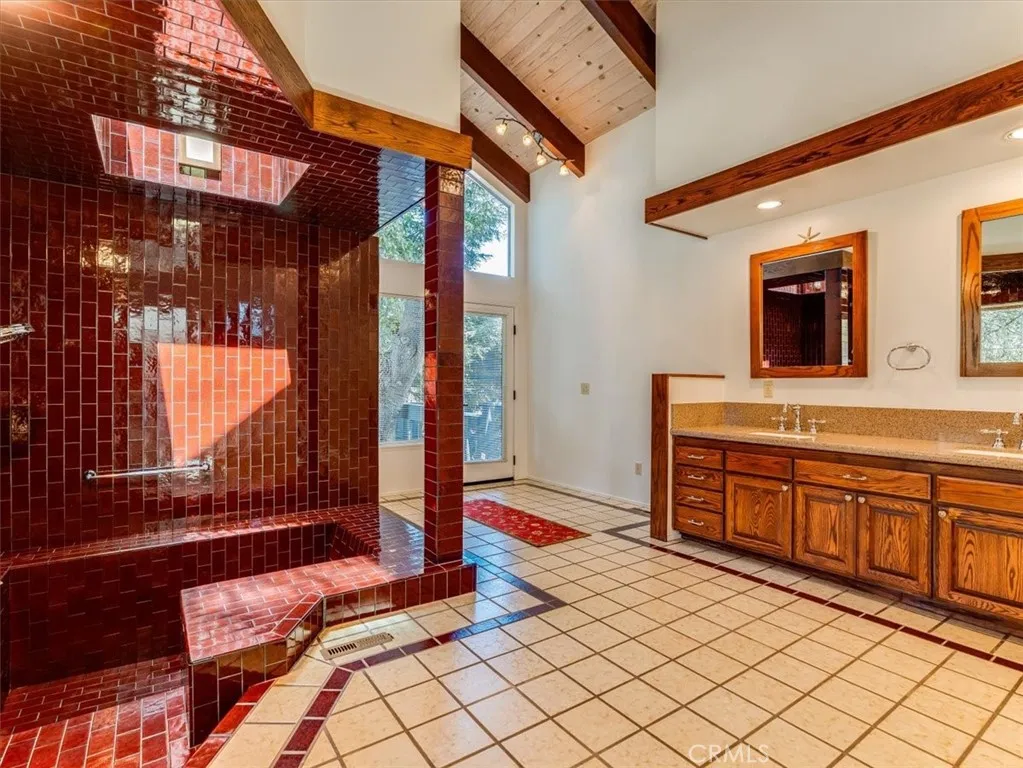 Primary Bathroom has a walk-in tile shower