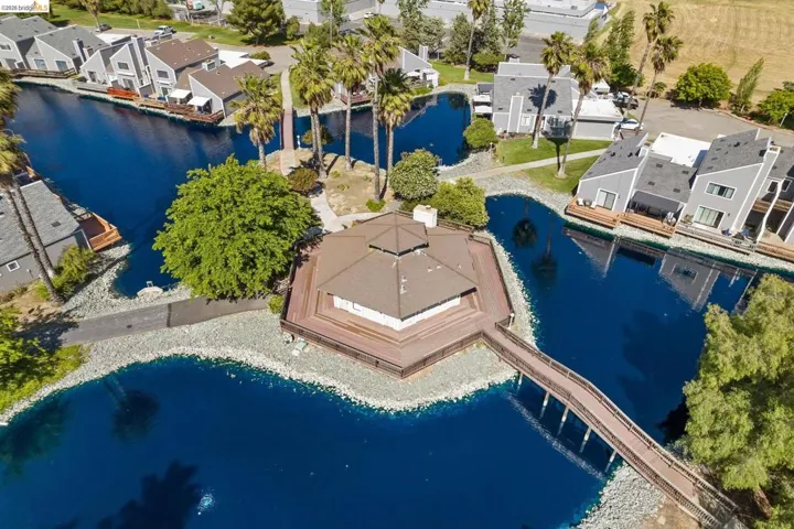 Waterfront community featuring multi-story residences with private docks