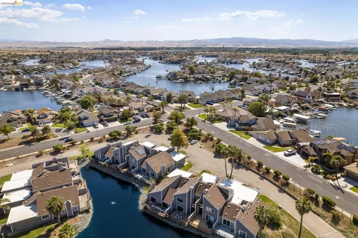 Expansive canal-front community featuring numerous residences with private boat docks
