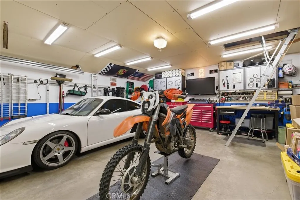 Finished garage, storage above and lights everywhere