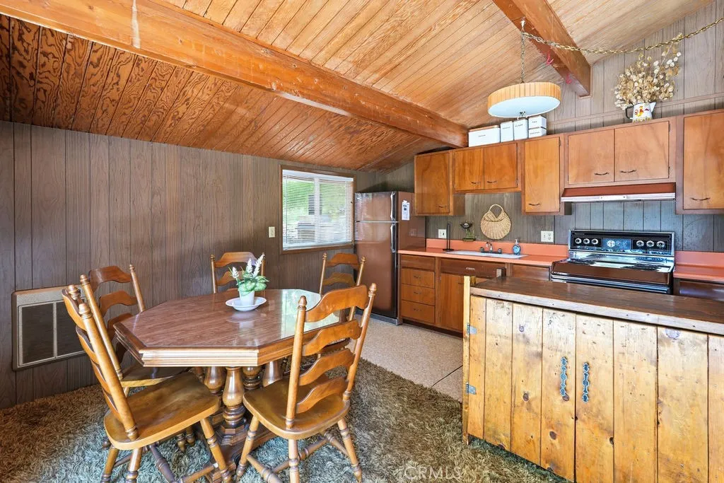 Dining area and kitchen Dining area and kitchen