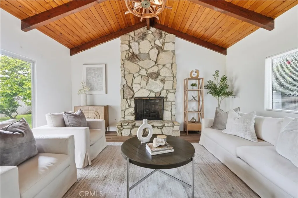 Family room with fireplace perfect for entertaining