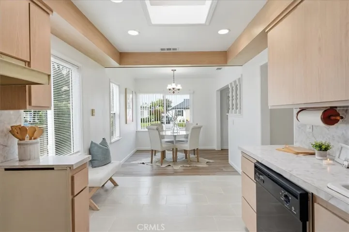 Shot from hallway through kitchen