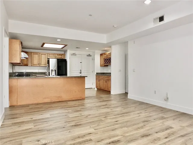 Living room flows to kitchen