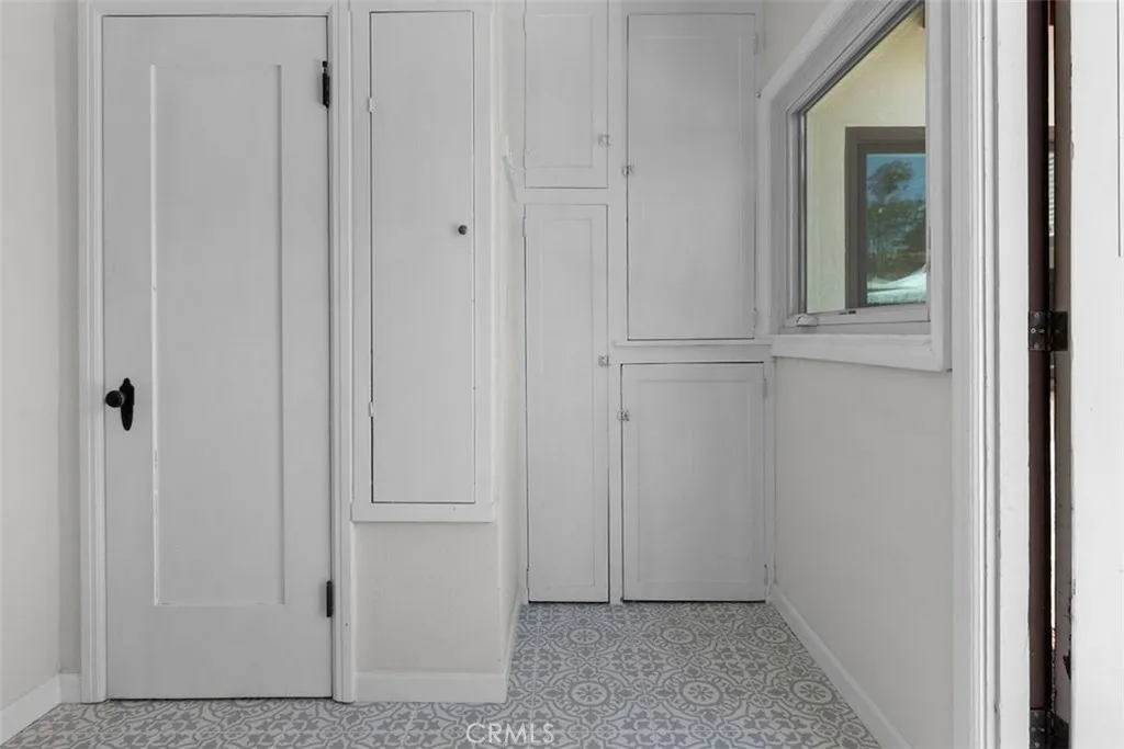 Laundry Room with pantry and plenty of storage space.