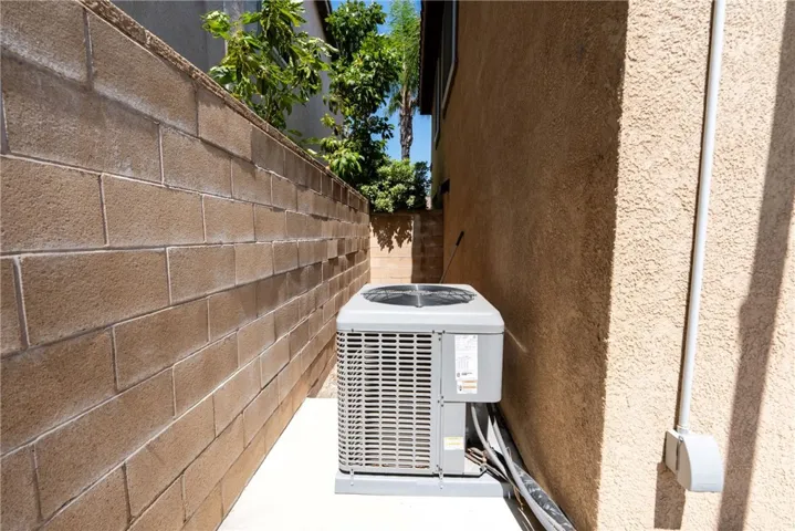 New HVAC Unit and walkway between Homes