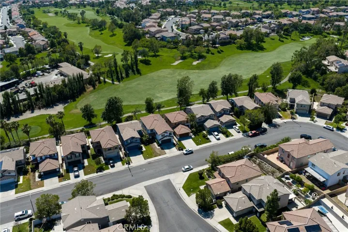 Drone Shot overlooking Street and Golf Course