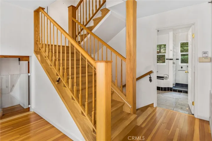Stairs from the office and bathroom up to the bedrooms