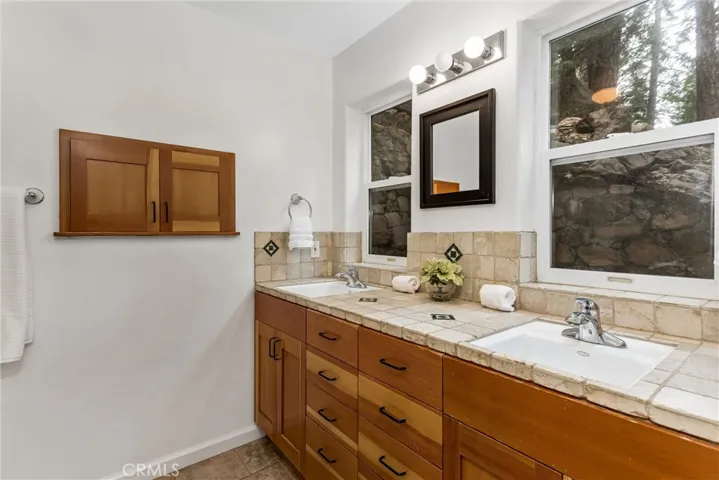 Bathroom #1 located near the entry to the home from the garage