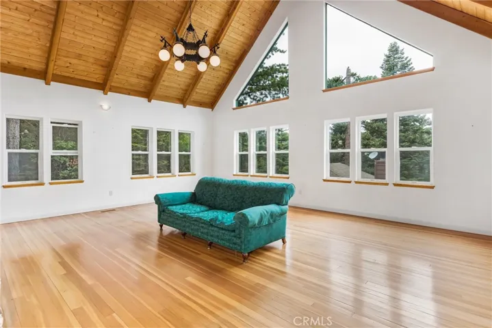 Living Room with loads of windows and plenty of natural light. Solid Fir flooring