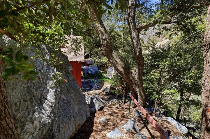 Access from the parking lot with a rail for safety. Very easy and not too steep.