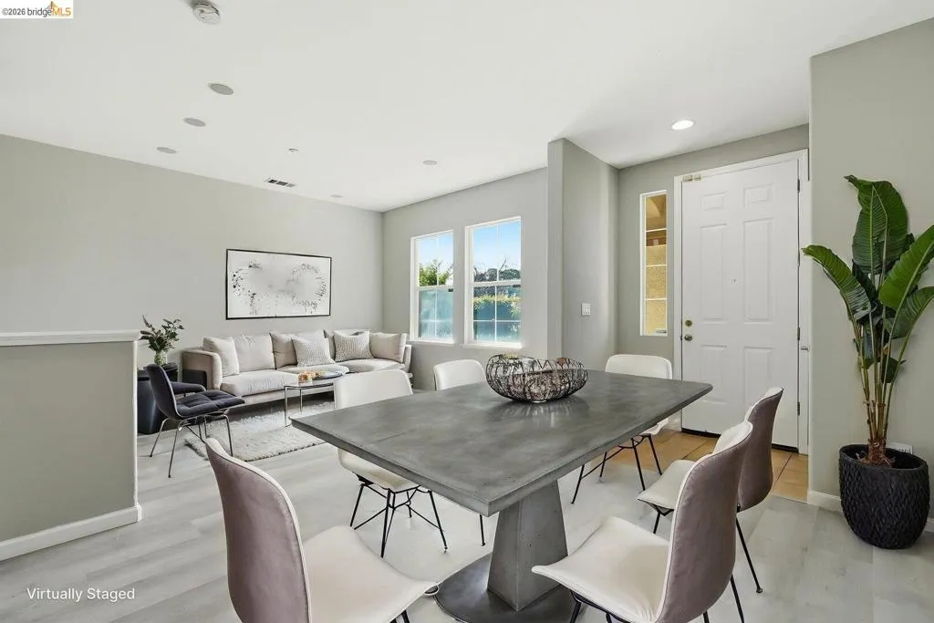 dining space featuring light wood-type flooring and recessed lighting