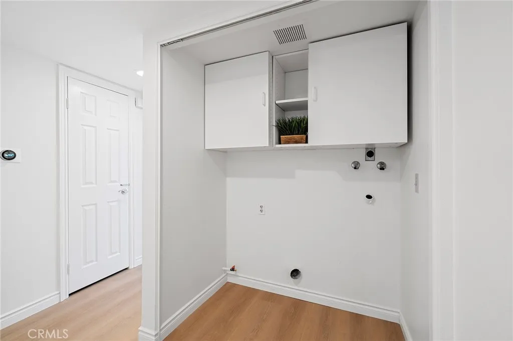 Upstairs laundry conveniently located near the bedrooms.
