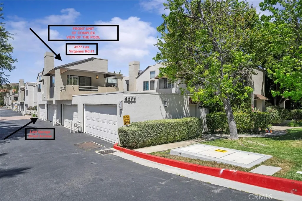 Unit is located in the front of the complex with brown awning. The garage is conveniently located at the end with direct access and right around the corner to the front door entrance.