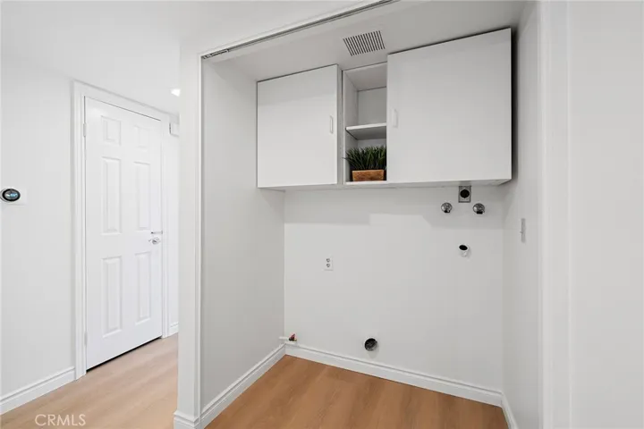 Upstairs laundry conveniently located near the bedrooms.