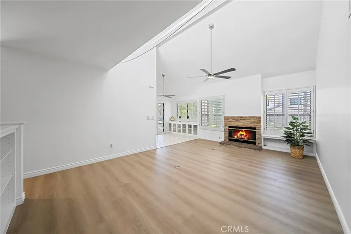 Living room opens to the bright dining area.