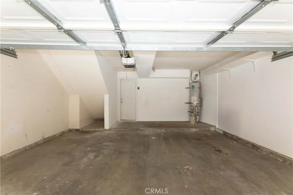 Private 2 car garage with storage area and direct access
