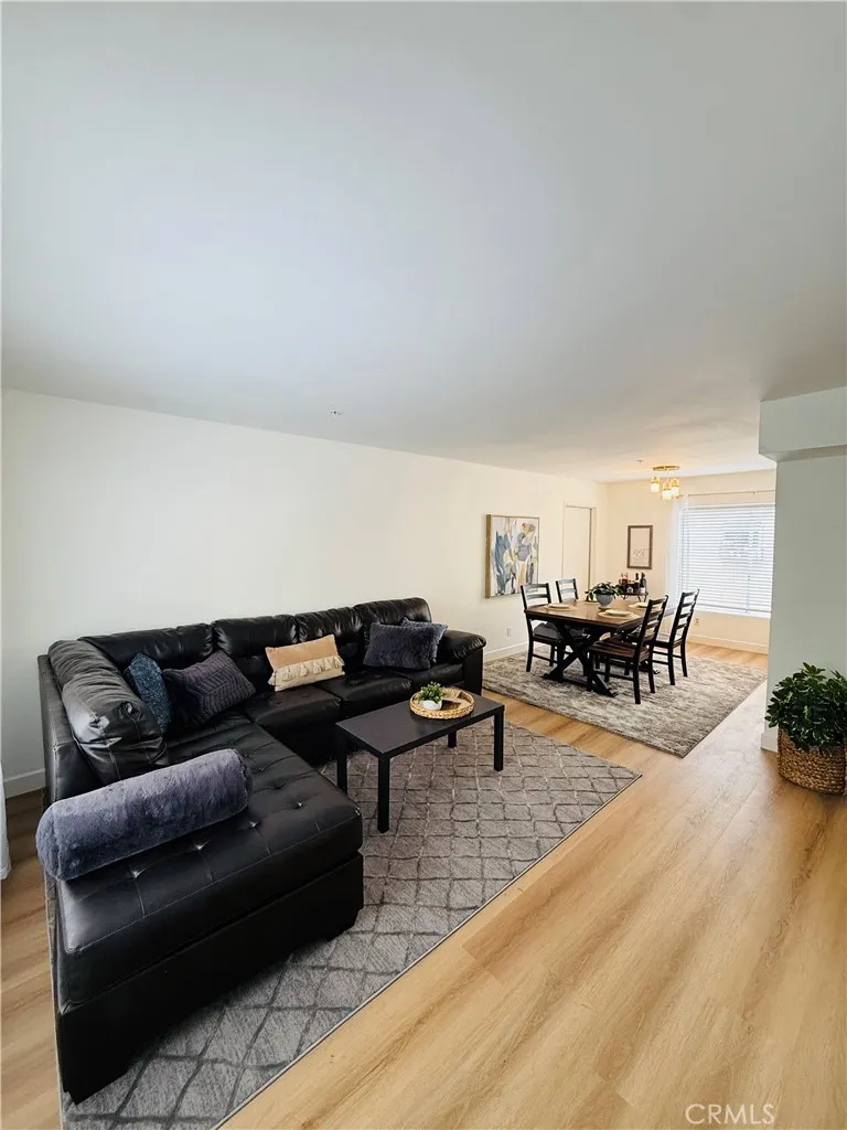 Expansive Living and Dining area with newer vinyl floors