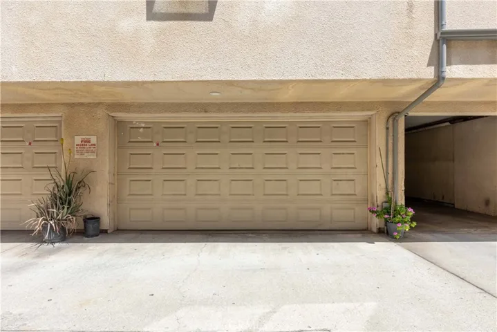Two car garage inside community gates for extra security