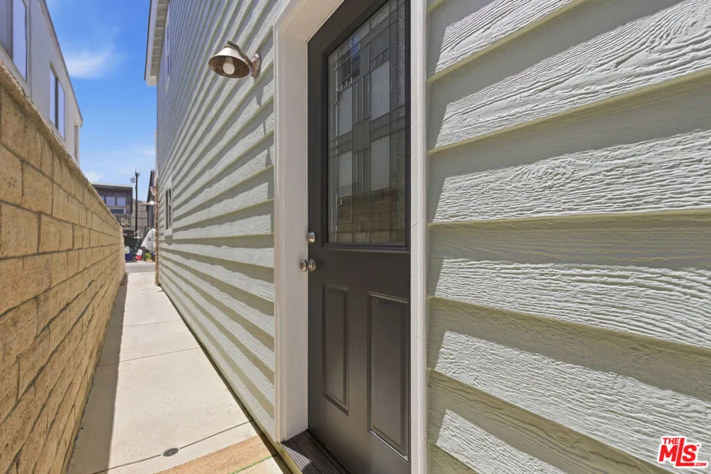 "Front" door of house on side