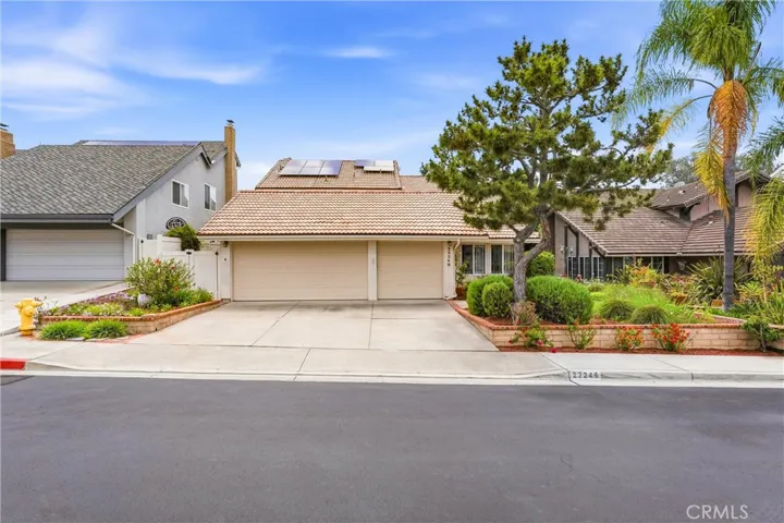 Three car garage on a quiet street