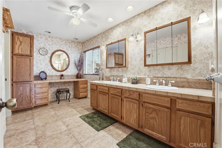 primary suite bathroom with vanity