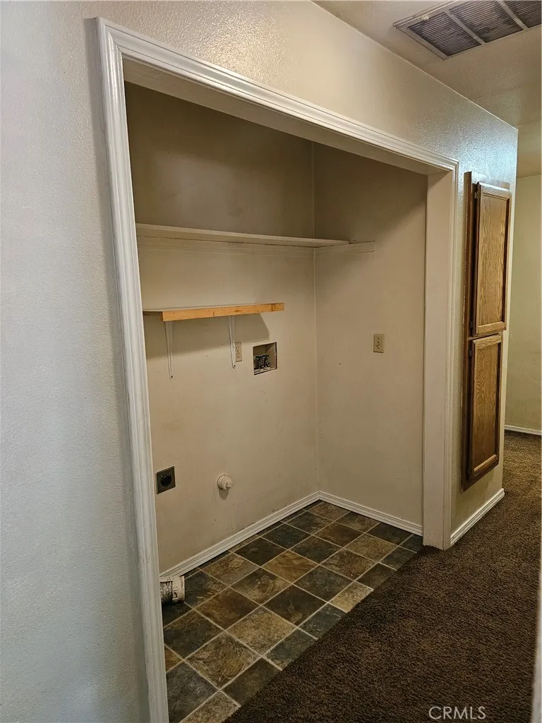 Hall way closet for washer , Dryer