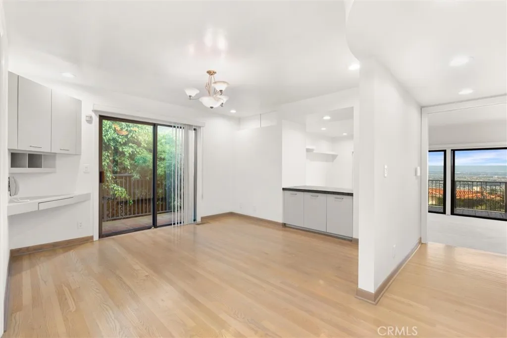 Breakfast nook leads to spacious family room