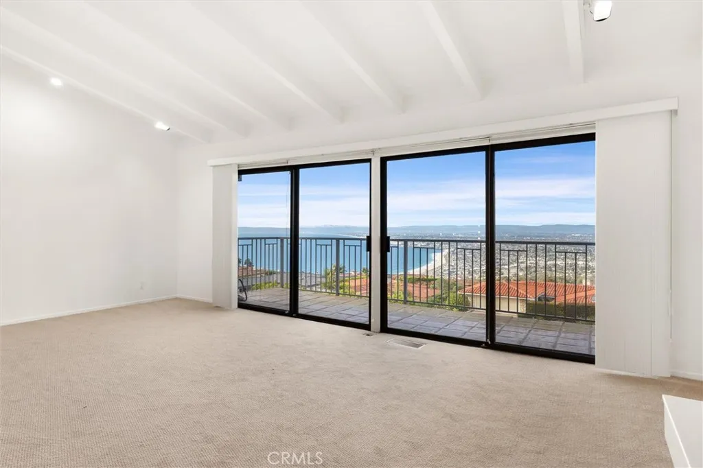 Primary bedroom -beamed ceilings...and VIEW!