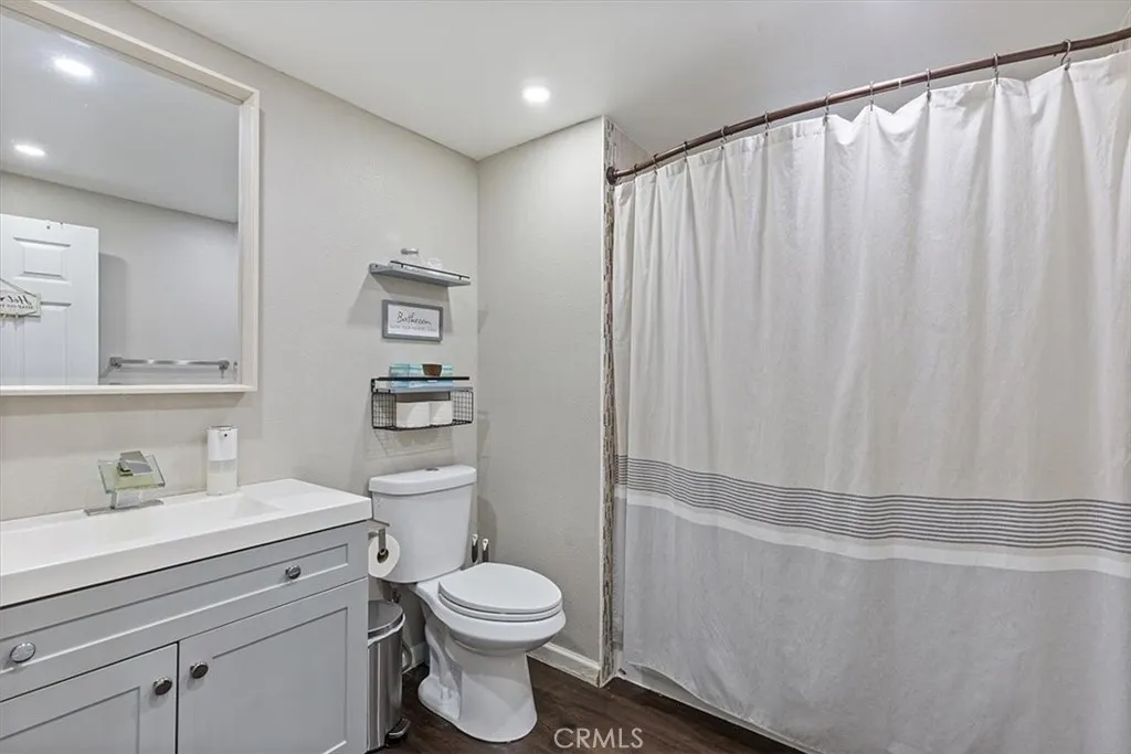 Second Bathroom: Roomy updated bathroom with shower/tub combo, modern vanity, and generous usable space.