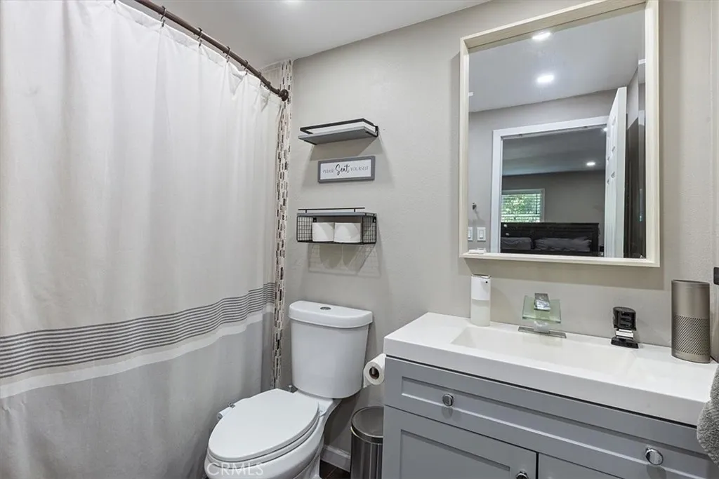 Second Bathroom: Roomy updated bathroom with shower/tub combo, modern vanity, and generous usable space.