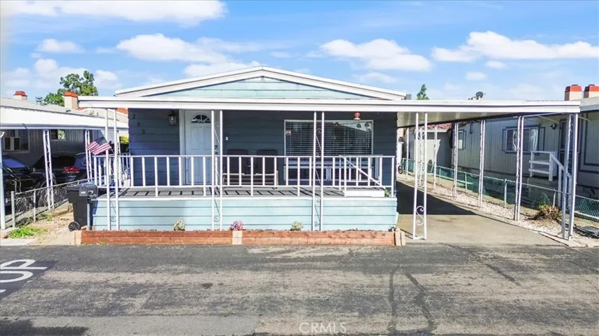 Front of home: 9080 Bloomfield spc 293, Cypress. Origional front