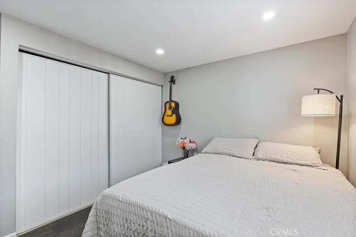 Bedroom 3: Flexible third bedroom with updated flooring, recessed lighting, neutral finishes, and space for bedroom, office, or study use.