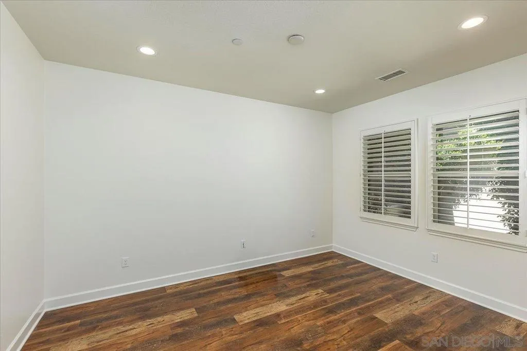 Just off the entry, could be an extra bed room