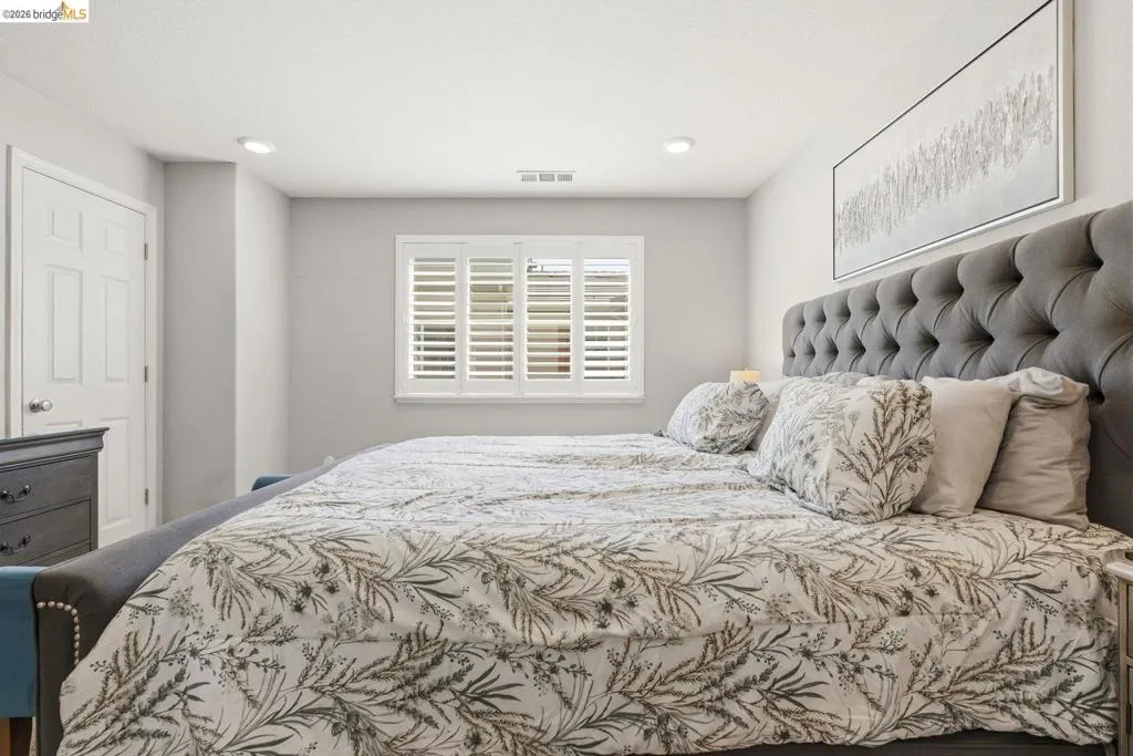 bedroom featuring recessed lighting