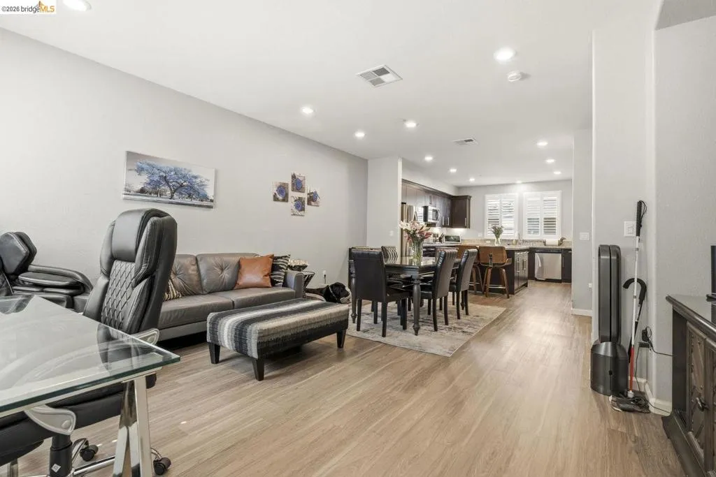 living room featuring light wood-style floors and recessed lighting
