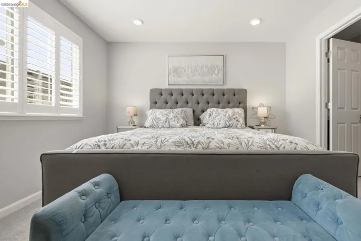 bedroom with recessed lighting and carpet