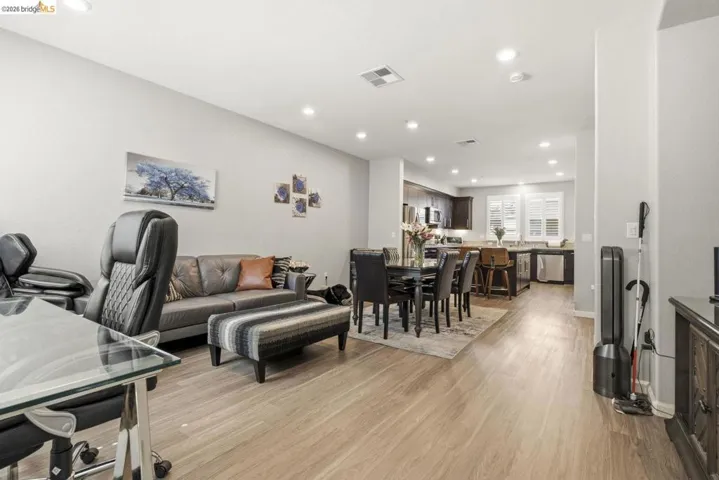 living room featuring light wood-style floors and recessed lighting