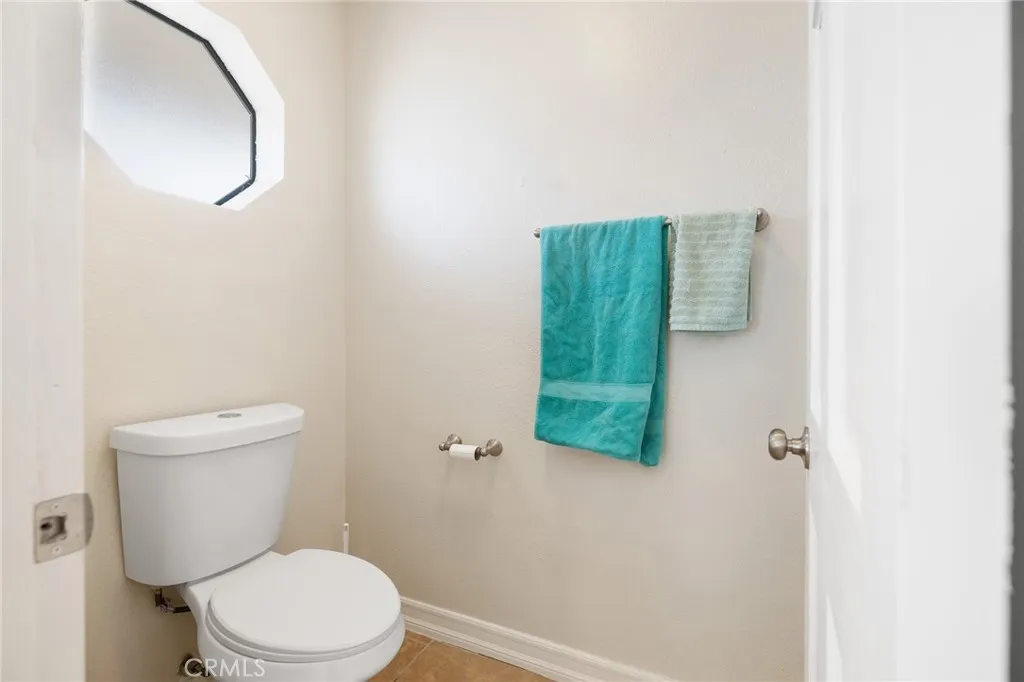 Behind the door is walk in shower