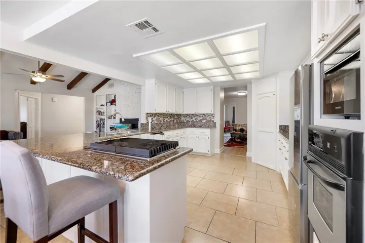 formal dining room or Den through the door at the rear of picture