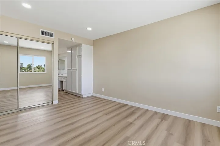 MIRRORED WARDROBE DOORS.