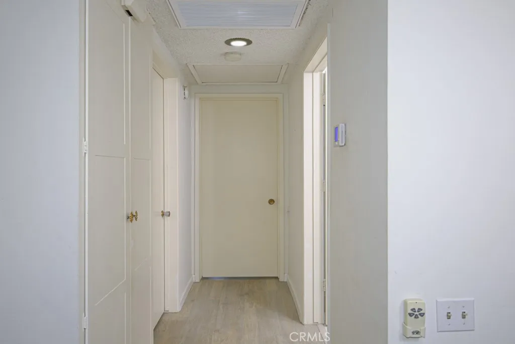 Hallway leading to the bedrooms and bathrooms.