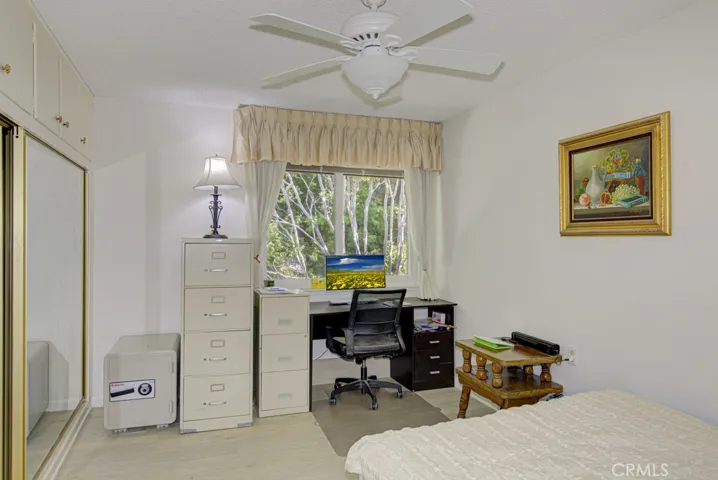 Versatile guest bedroom could also serve as a home office, workout area, sewing room or arts and crafts studio.