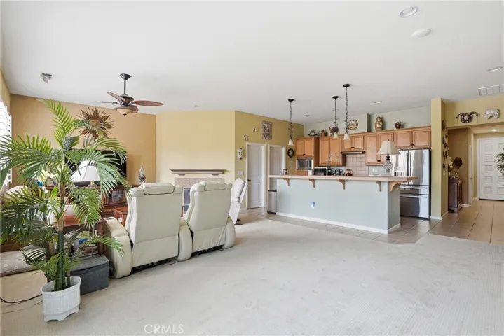 Dining Area With Kitchen & Great Room In Background